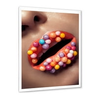 DesignArt 'Izbliza kreativnog šminkanja na ženskim usnama s modernim uokvirenim umjetničkim printom Lolipopsa